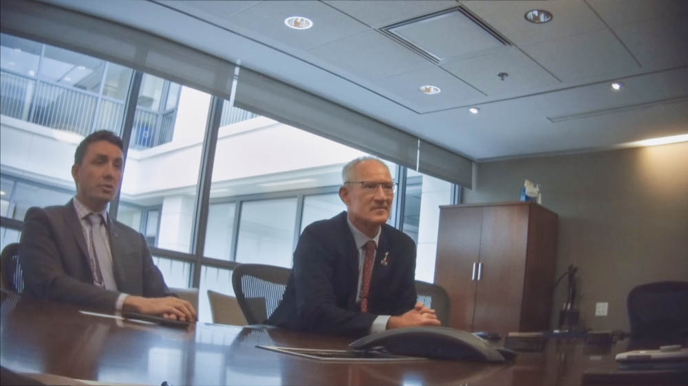 James Ashby (left) and Steve Dickson (right) at a meeting with Koch Industries [Al Jazeera]