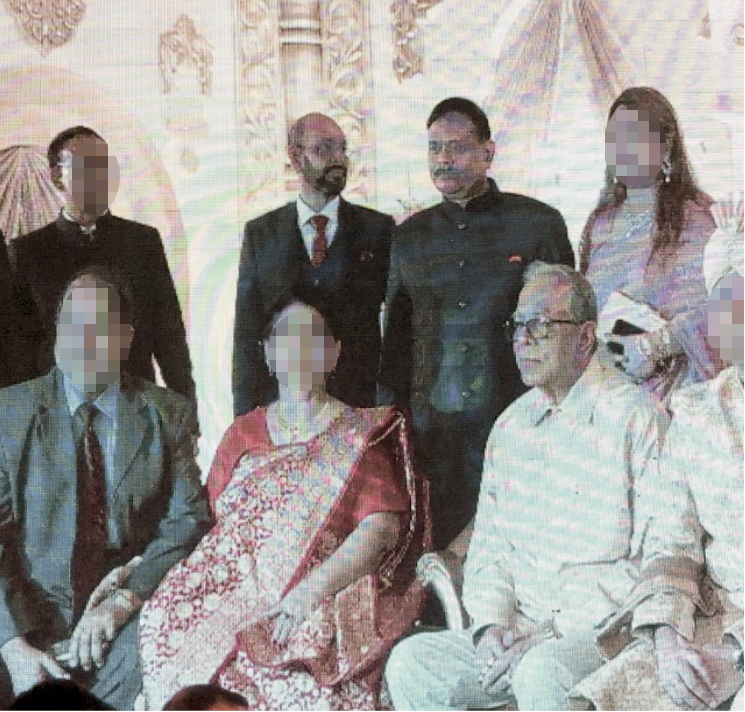 Haris Ahmed, left, Aziz Ahmed, centre, and President Mohammed Abdul Hameed, right [Al Jazeera]