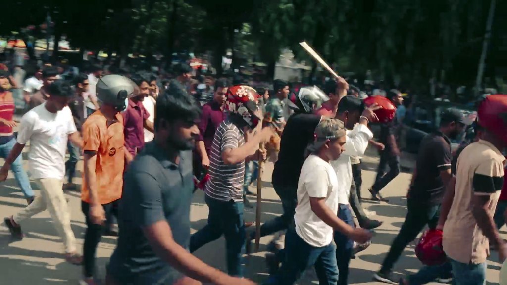 Image of supporters of Chattra League attacking student protesters.
